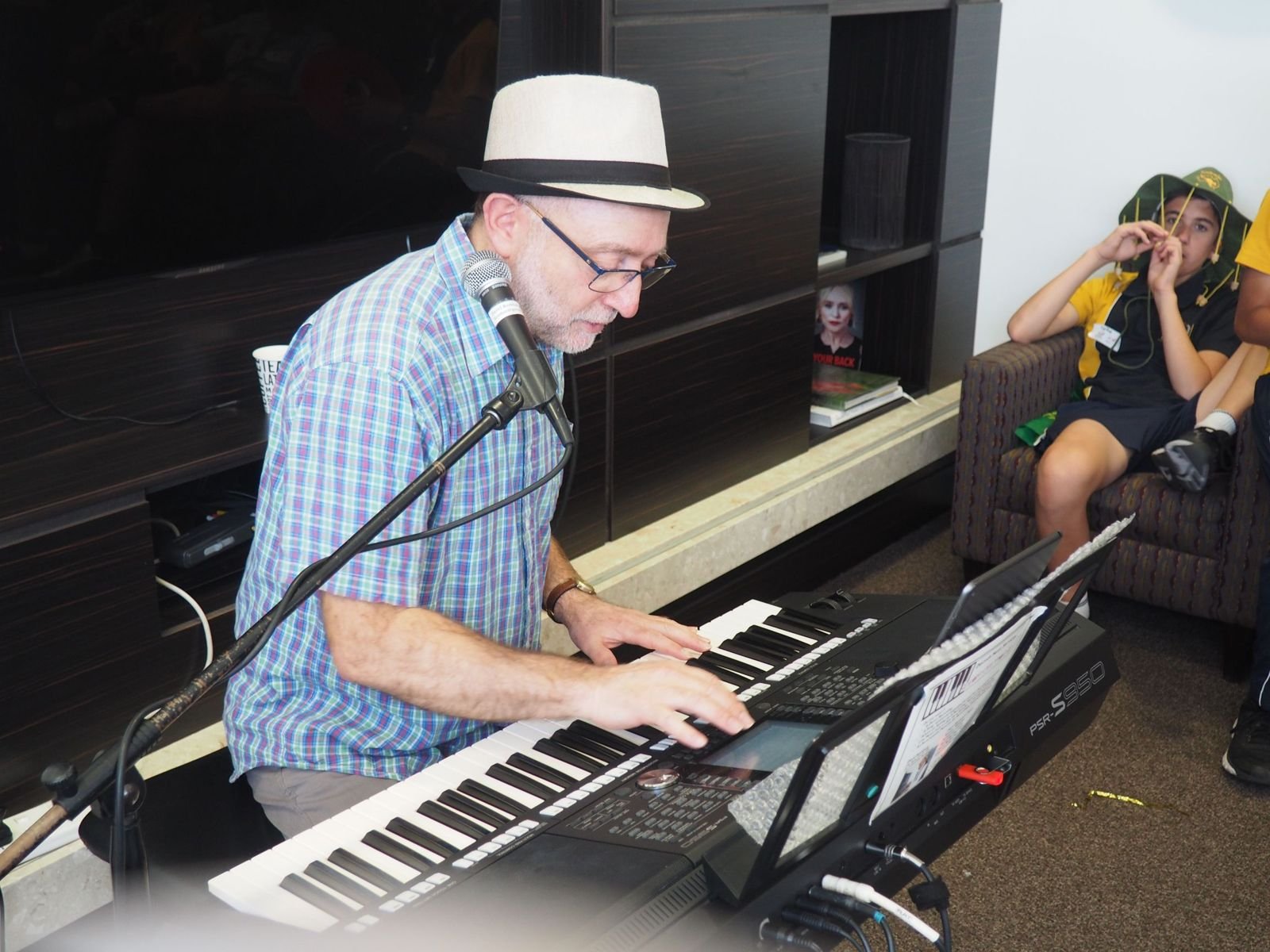 A pianist entertaining seniors
